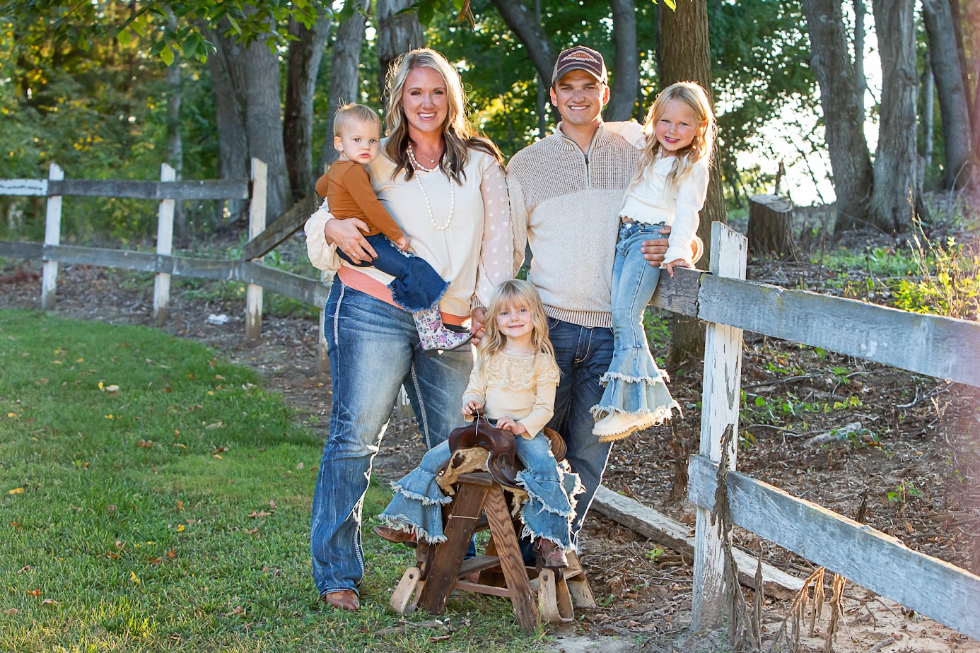 Kyle and Krista Knops with their three daughters on the farm in Clayton, Wisconsin